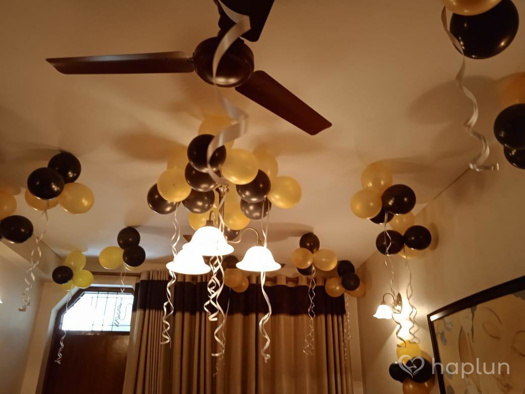 golden and black anniversary decoration
