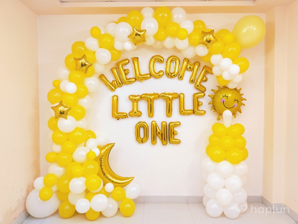 Yellow and White Baby Arrive Decor
